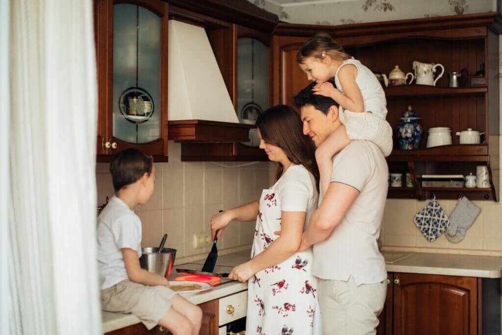 A family makes dinner together.