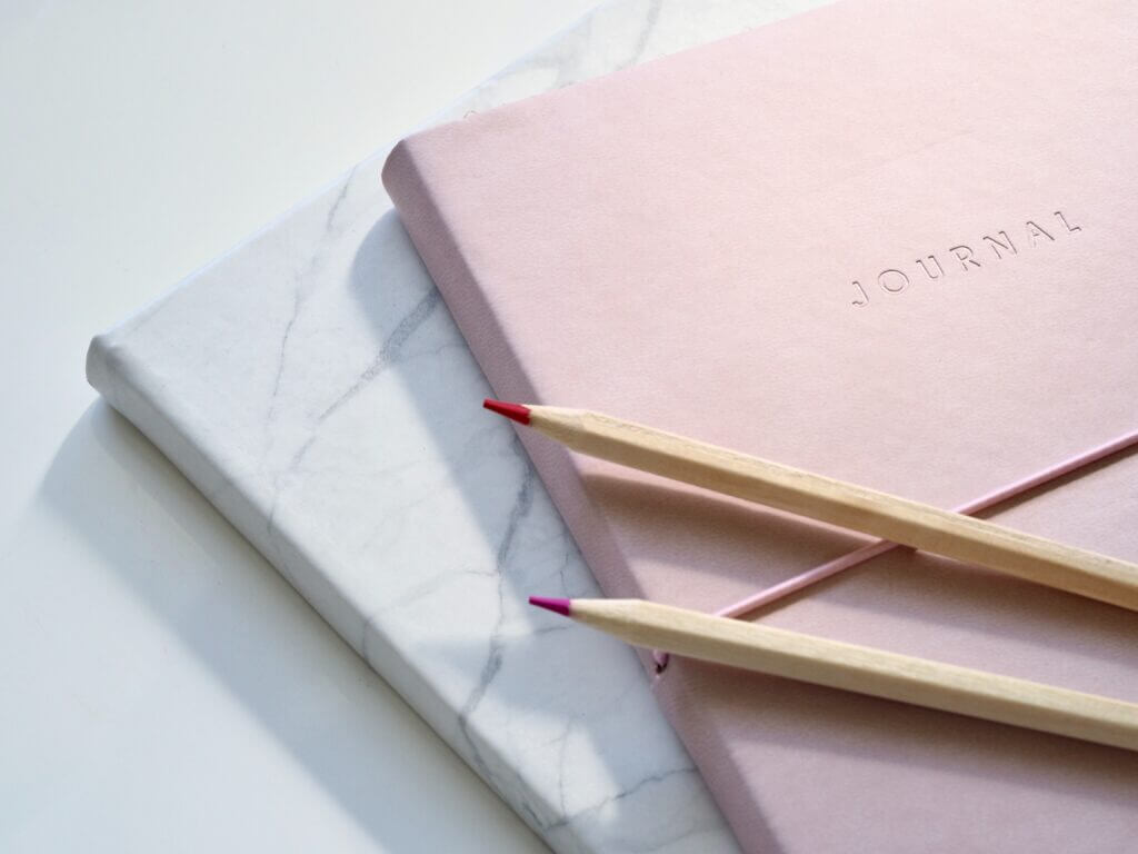 Two journals stacked on top of eachother