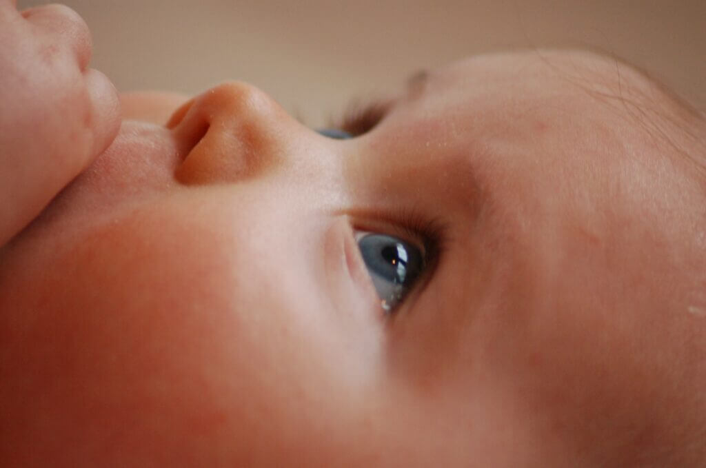 A baby looks up A baby looks up